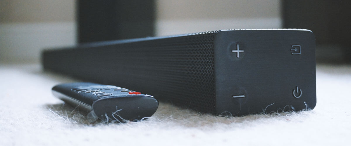 add surround sound speakers to the soundbar